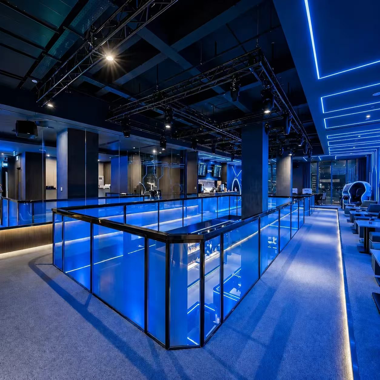 Blue-lit pool area.